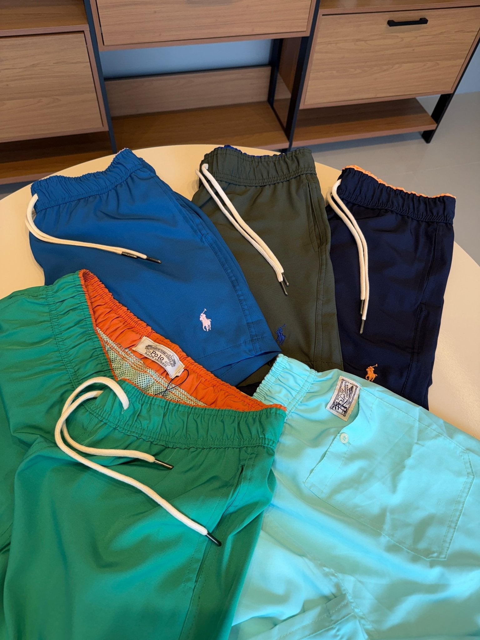 Short Ralph. Marinho Logo Laranja