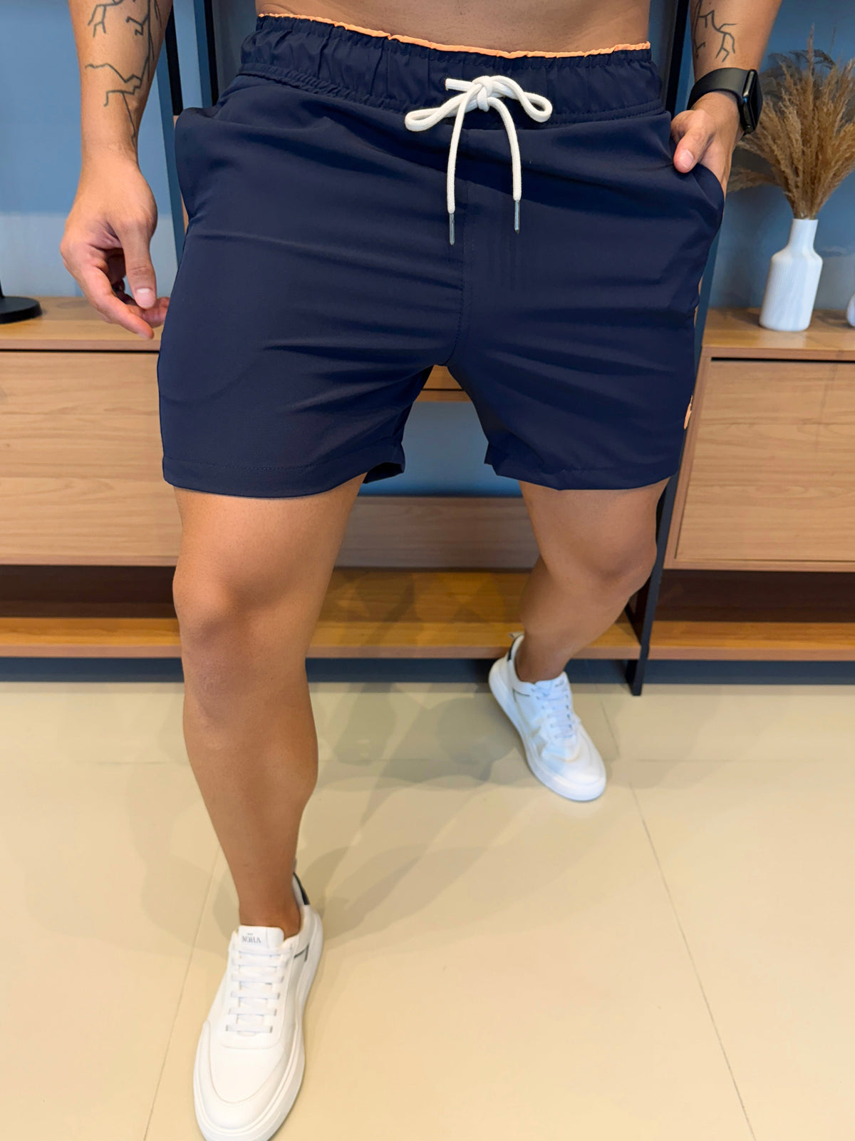 Short Ralph. Marinho Logo Laranja