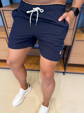 Short Ralph. Marinho Logo Laranja