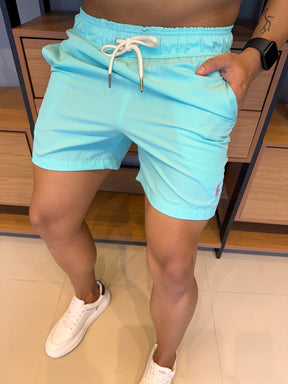 Short Ralph. Turquesa Logo Roxo